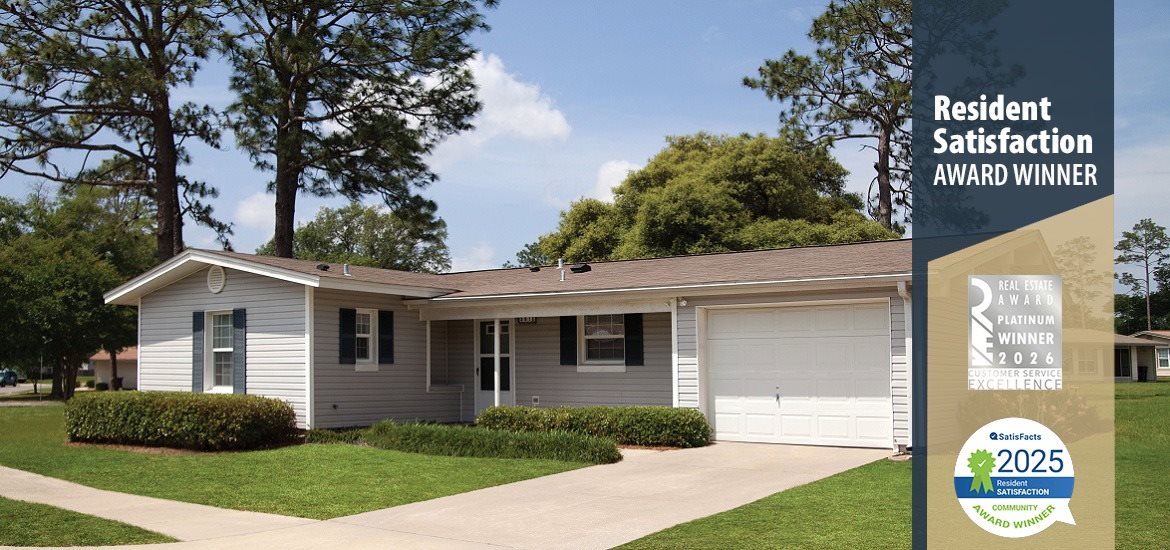 A residential house with a sign indicating it is a resident satisfaction award winner.